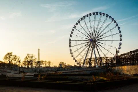 The ferris wheel and the Eiffel Tower in Paris Stock Photos