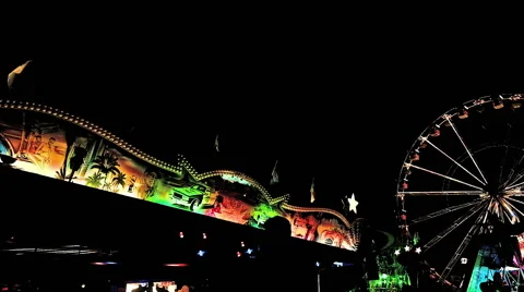 FERRIS WHEEL AND FUN FAIR AT NIGHT  Stock Footage 52437063