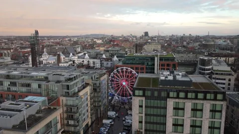 Ferris Wheel and Modern Architecture in Dublin's Smithfield from Above Stock Footage 332445494