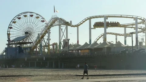Ferris Wheel and Roller Coaster at Santa Monica Pier Los Angeles California Stock Footage 256124007