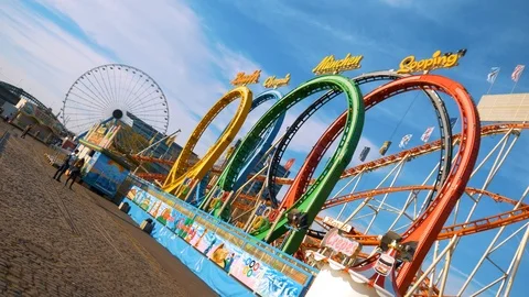 Ferris Wheel And Rollercoaster Stock Footage 106627920