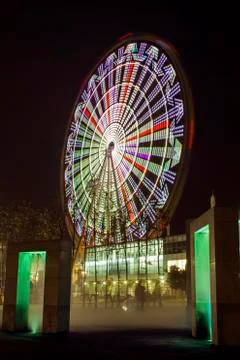 Ferris Wheel and Statue Stock Photos