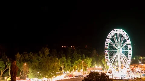 Ferris wheel and thunderstorm in background in Otranto Italy 動画素材 99310149