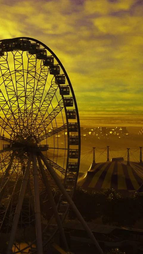 Ferris wheel and vibrant sunset create magical atmosphere by the fairgrounds Stock Footage 331649470