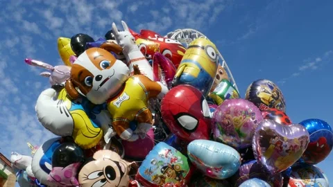 Ferris wheel with balloons on Bremen Easter meadow Stock Footage 239630011