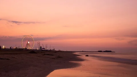 Ferris wheel at beach in sunset timelapse Stock Footage 122903084