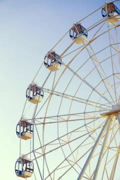 Ferris wheel on blue background vertically Stock Photos