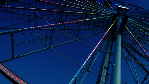 Ferris wheel on blue night sky Stock Footage 138664341