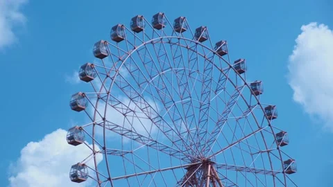 Ferris wheel on a blue sky background Stock Footage 164217953