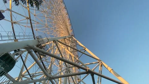 Ferris wheel on a blue sky background Stock Footage 225905934