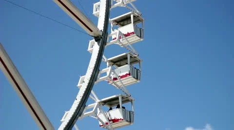 Ferris wheel on blue sky Stock Footage 23394650