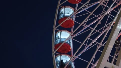 Ferris Wheel Cabins Rotating At Night Near Battersea Power Station London Vídeo Stock 344618491