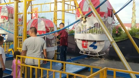 Ferris wheel chain ready to be played at the night market Stock Footage 275590683