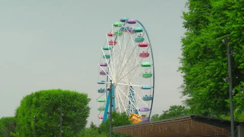 Ferris wheel on clear blue sky background 動画素材 344463817
