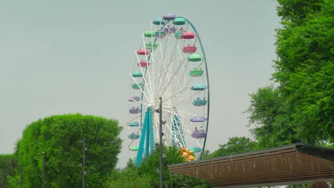 Ferris wheel on clear blue sky background 動画素材 344463959