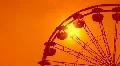Ferris wheel detail. Dreamy orange sunset. HD Footage