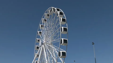 Ferris wheel with enclosed cabins Video stock 342623916