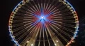 Ferris Wheel entry tilt down at Christmas fair HD Footage