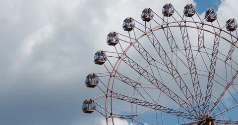 Ferris wheel on fun fair on blue sky white clouds background, timelapse video. Stock Footage 134990796