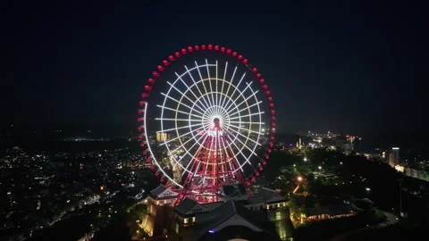 Ferris wheel glowing over Ha Long at night, Quang Ninh, Vietnam Stock-Footage 342715438