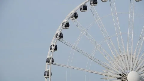 Ferris Wheel Going Around With Copyspace In Amusement Park Video stock 246969337