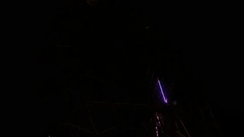 Ferris wheel illuminated at night. Carousel lights in the park Stock-Footage 132774331