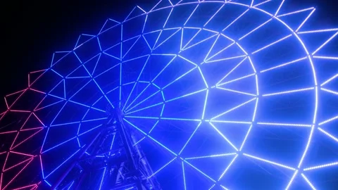 Ferris wheel illuminated at night. Carousel lights in the park Stock Footage 150918399