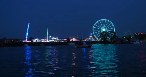 Ferris Wheel Illuminated at Night During Tall Ships Races in Szczecin Video stock 339616230