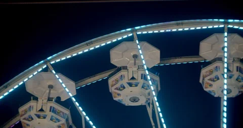 Ferris wheel lit up at night Stock Footage 115544906
