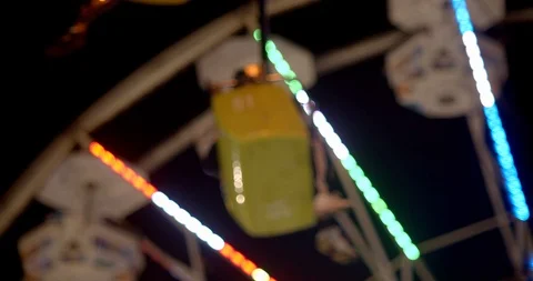 Ferris wheel lit up at night Stock Footage 115544980