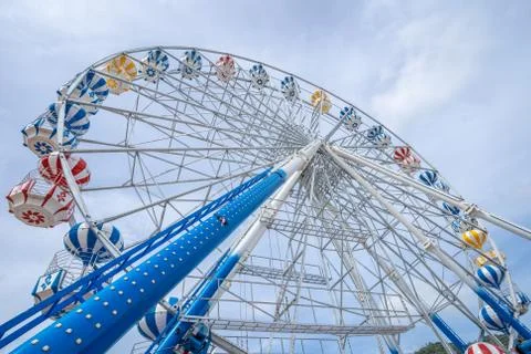 Ferris Wheel, low angle view of a big Ferris Wheel - Image. Stock Photos