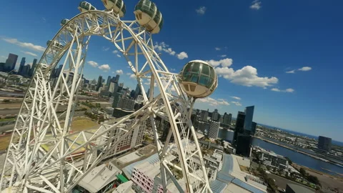 Ferris wheel in Melbourne FPV drone video. Amusement park. Stock Footage 249756439