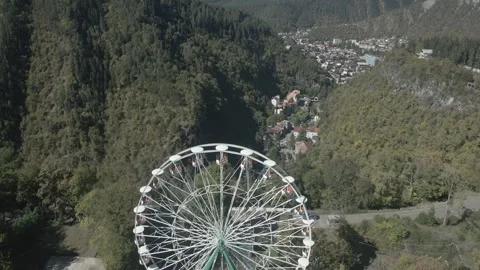 Ferris wheel in the mountains Stock Footage 291702726