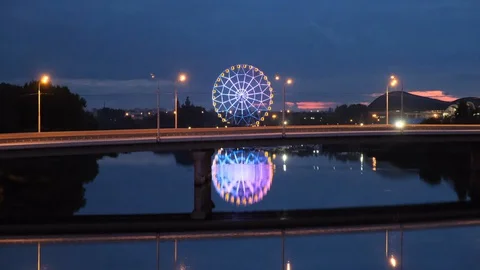 Ferris wheel with multicolored lights Stock Footage 128175570