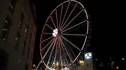 Ferris wheel at night with colored lights 03 Stock Footage 108602071