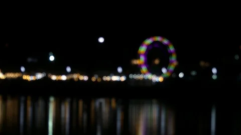 Ferris wheel at night by the river 스톡 동영상 108271552