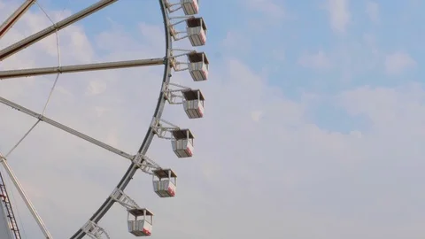Ferris wheel over blue sunset sky Stock Footage 77385548