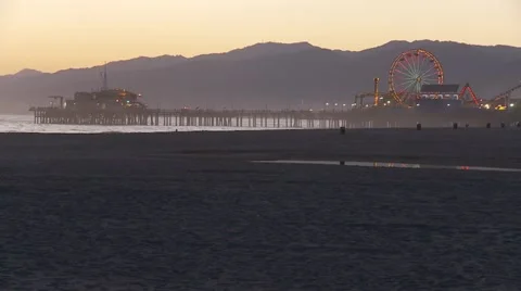Ferris wheel on the pier, at dusk. Stock Footage 10903039