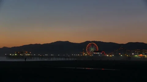 Ferris wheel at the pier at dusk. Stock Footage 10903053