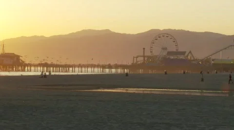 Ferris Wheel on Pier at Sunset Stock Footage 117521