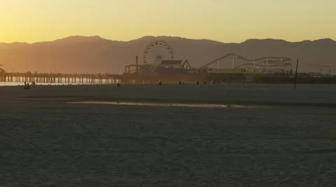 Ferris Wheel on Pier at Sunset Stock Footage 10902997