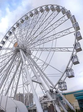 The Ferris wheel revolves around its axis. Stock Photos