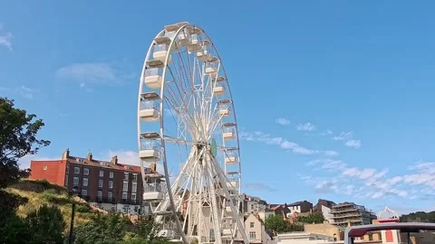 Ferris wheel on the seafront. Pull back shot Stock-Footage 313563714