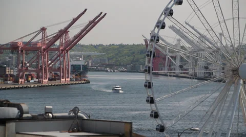 Ferris wheel in Seattle with Freight Harbor in background  Stock Footage 39174501