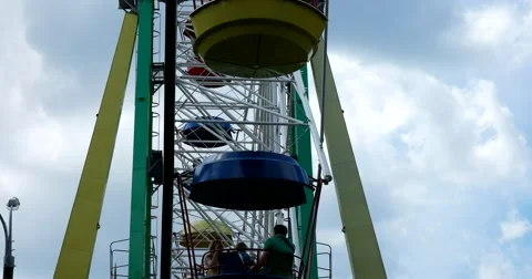 Ferris wheel on sky background Stock Footage 64819400
