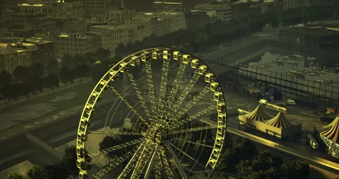 Ferris wheel stands tall over the bustling amusement park at twilight Stock Footage 319670481