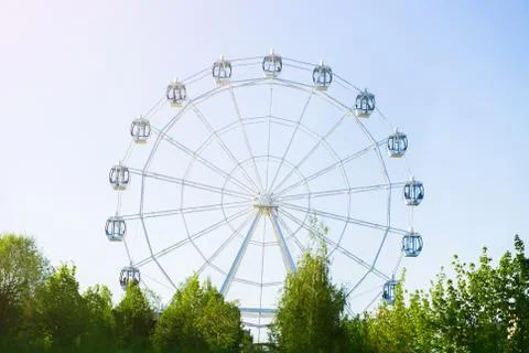 Ferris wheel, sun Stock Photos