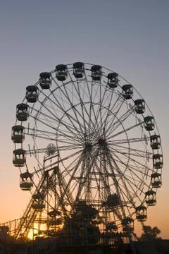 Ferris Wheel At Sunset Stock Photos