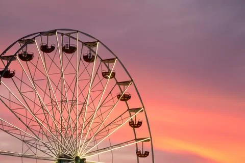 Ferris wheel at the sunset Stock Photos