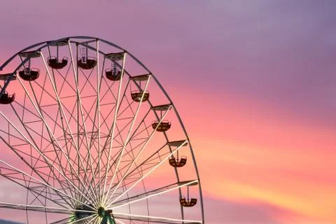 Ferris wheel at the sunset Stock Photos